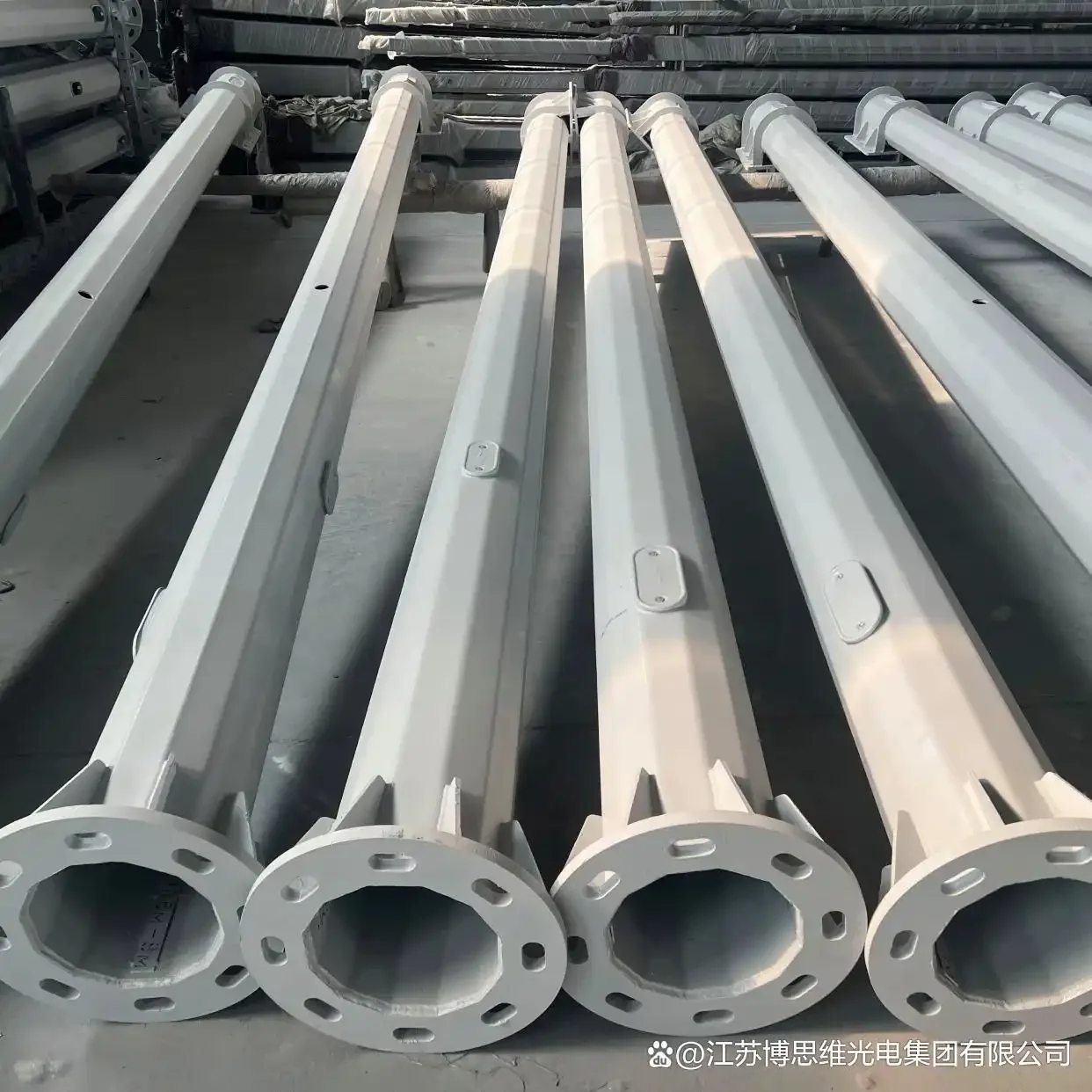 Finished steel pole sections in storage
